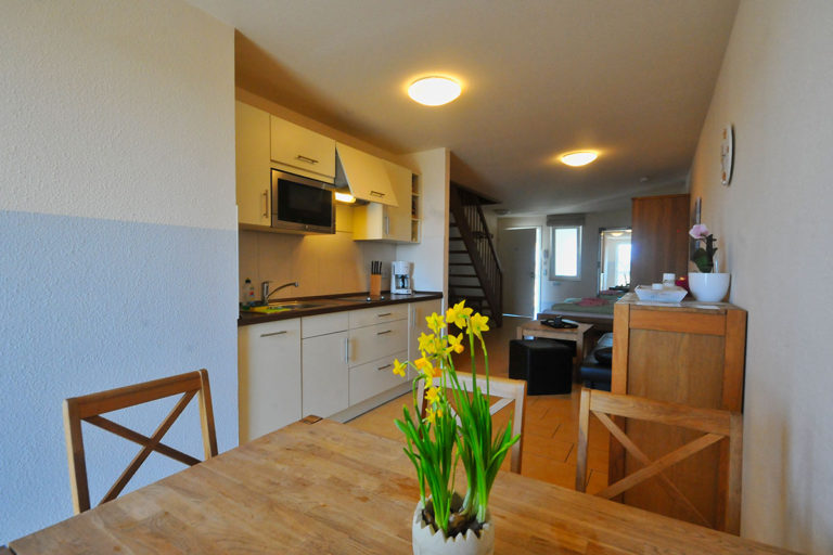 Ferienwohnung 08 in Sellin – Wohnbereich